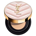 YSL pink cushion foundation compact with gold case on a soft beige background.